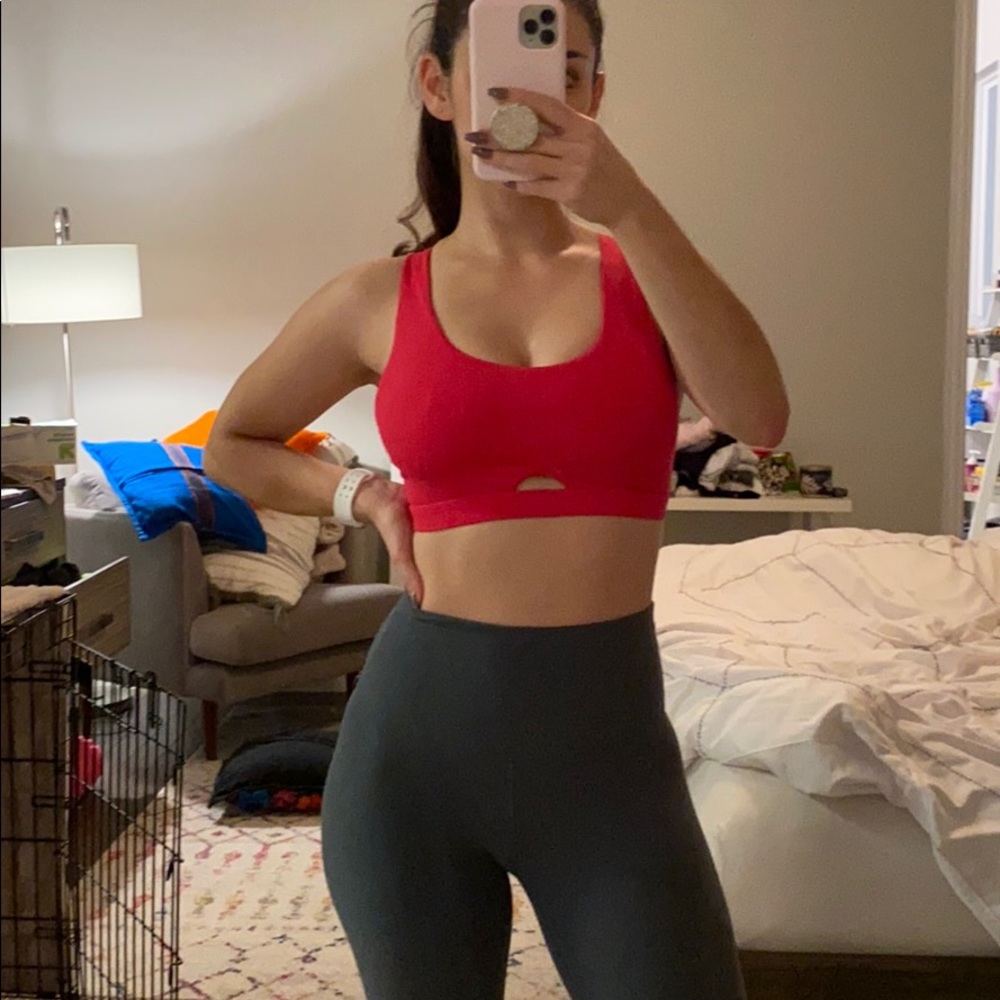 Hot pink Fabletics sports bra.